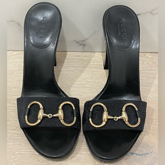 Gucci Shoes - Authentic Gucci heeled slide sandals in black with Gold tone horse bit hardware.